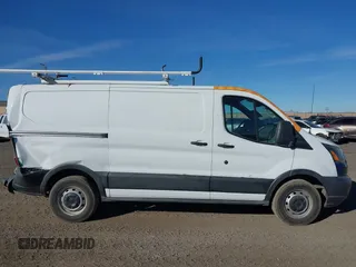 2016 Ford Transit Cargo z VIN 1FTYE1YM2GKB18602, wystawiony jako IAAI lot #41091180 z przebiegiem 143 262 mil mil oraz . Historia ofert i sprzedaży dostępna na DreamBid. Obrazek 13.
