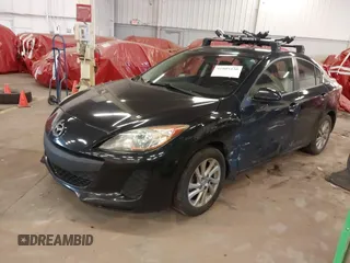2012 Mazda Mazda3 i Touring with VIN JM1BL1V88C1540974, listed as a IAAI auction lot 41809430 with 121,334 mi miles. Bid and sale history available at carsss.com. Image 17.