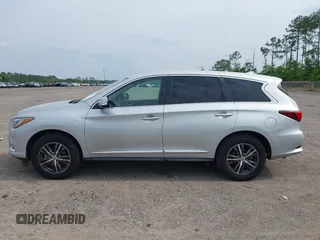2020 Infiniti QX60 Luxe z VIN 5N1DL0MN9LC528083, wystawiony jako IAAI lot #42414461 z przebiegiem 87 812 mil mil oraz . Historia ofert i sprzedaży dostępna na DreamBid. Obrazek 14.