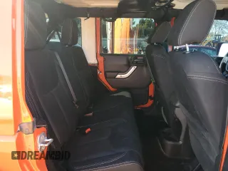 2015 Jeep Wrangler Unlimited Rubicon with VIN 1C4BJWFG7FL719038, listed as a Copart auction lot 51507205 with 62,664 mi miles and Salvage Title. Bid and sale history available at carsss.com. Image 10.