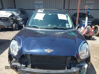 2014 MINI Countryman S with VIN WMWZC3C5XEWP27221, listed as a IAAI auction lot 41957817 with 112,353 mi miles and . Bid and sale history available at DreamBid. Image 13.