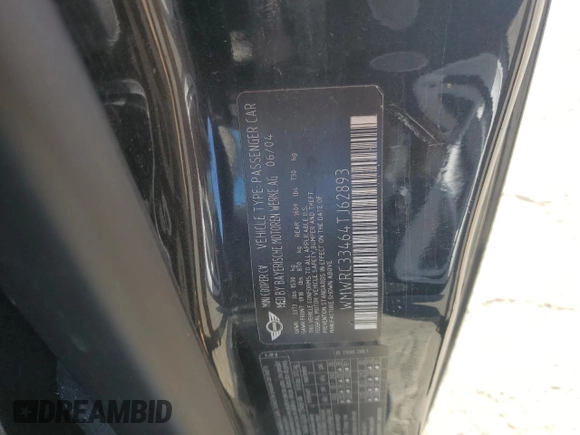 2004 MINI Hardtop with VIN WMWRC33464TJ62893, listed as a Copart auction lot 51905565 with 141,958 mi miles and Salvage Title. Bid and sale history available at DreamBid. Image 13.