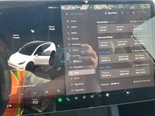 2022 Tesla Model Y Long Range with VIN 7SAYGAEE7NF376795, listed as a Copart auction lot 55113135 with 66,796 mi miles and Salvage Title. Bid and sale history available at carsss.com. Image 9.