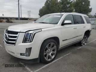 2015 Cadillac Escalade Premium z VIN 1GYS3CKJ6FR281209, wystawiony jako Copart lot #54425135 z przebiegiem 102 534 mil mil oraz Szkody całkowita. Historia ofert i sprzedaży dostępna na DreamBid. Obrazek 1.