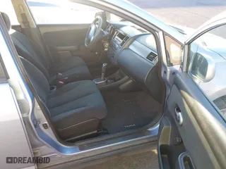 2010 Nissan Versa 1.8 S with VIN 3N1BC1CP2AL468124, listed as a IAAI auction lot 41873165 with 138,765 mi miles. Bid and sale history available at carsss.com. Image 5.