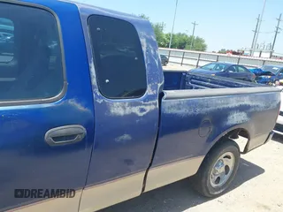 1998 Ford F-150 with VIN 1FTZX1725WKB57987, listed as a IAAI auction lot 42854030 with 210,471 mi miles and . Bid and sale history available at DreamBid. Image 6.
