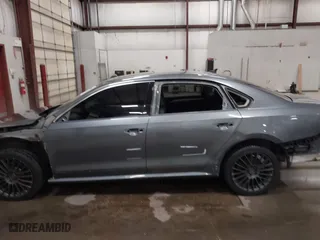 2015 Volkswagen Passat 2.0L TDI SE w/Sunroof with VIN 1VWBV7A3XFC094226, listed as a IAAI auction lot 41838239 with 169,737 mi miles. Bid and sale history available at carsss.com. Image 15.