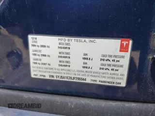 2018 Tesla Model S 75D z VIN 5YJSA1E28JF296944, wystawiony jako IAAI lot #41298541 z przebiegiem 29 828 mil mil oraz . Historia ofert i sprzedaży dostępna na DreamBid. Obrazek 9.
