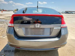 2010 Honda Insight LX with VIN JHMZE2H52AS043392, listed as a Copart auction lot 61347625 with 194,248 mi miles and Salvage title. Bid and sale history available at DreamBid. Image 6.