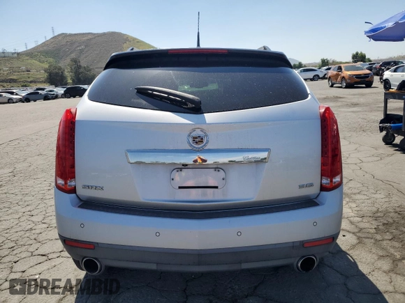 2012 Cadillac SRX Luxury Collection with VIN 3GYFNAE36CS653119, listed as a Copart auction lot 53866715 with 69,997 mi miles and Salvage Title. Bid and sale history available at DreamBid. Image 6.