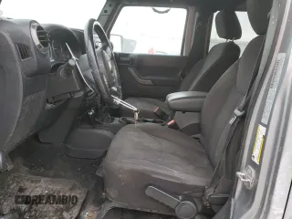 2015 Jeep Wrangler Unlimited Willys Wheeler with VIN 1C4BJWDG9FL516493, listed as a Copart auction lot 45098345 with 152,009 mi miles and Salvage Title. Bid and sale history available at DreamBid. Image 7.