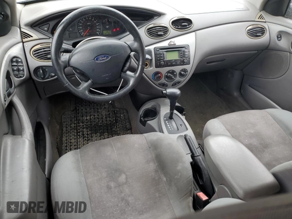 2004 Ford Focus with VIN 3FAFP37Z94R101447, listed as a Copart auction lot 74570054 with 162,166 mi miles and Salvage title. Bid and sale history available at DreamBid. Image 8.