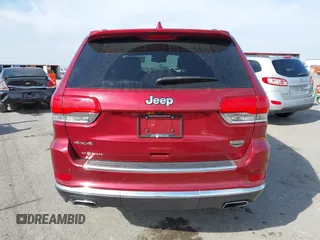 2014 Jeep Grand Cherokee Summit with VIN 1C4RJFJG6EC328516, listed as a IAAI auction lot 40698068 with 195,798 mi miles and . Bid and sale history available at DreamBid. Image 16.