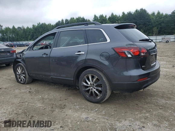 2014 Mazda CX-9 Grand Touring with VIN JM3TB2DA8E0440925, listed as a Copart auction lot 61002275 with 180,373 mi miles and Salvage title. Bid and sale history available at DreamBid. Image 2.