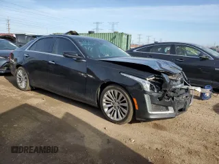 2014 Cadillac CTS Luxury AWD with VIN 1G6AX5S39E0147660, listed as a Copart auction lot 48681735 with 136,888 mi miles and Clean Title. Bid and sale history available at DreamBid. Image 4.