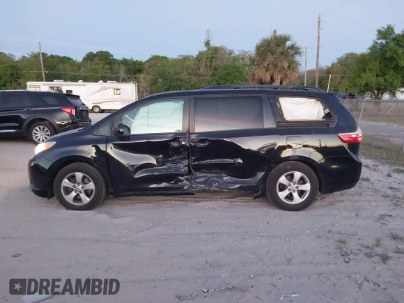 2015 Toyota Sienna LE AAS with VIN 5TDKK3DC2FS685245, listed as a IAAI auction lot 41849185 with 141,545 mi miles. Bid and sale history available at carsss.com. Image 14.