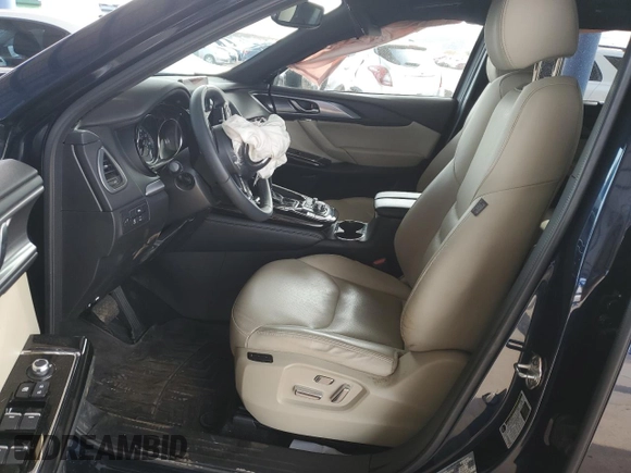 2018 Mazda CX-9 Grand Touring z VIN JM3TCADY2J0220873, wystawiony jako Copart lot #49264875 z przebiegiem Nie podano mil oraz Szkoda całkowita • Salvage title. Historia ofert i sprzedaży dostępna na DreamBid. Obrazek 7.