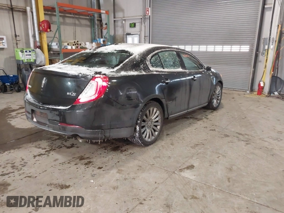 2014 Lincoln MKS with VIN 1LNHL9DK8EG609955, listed as a IAAI auction lot 41580770 with 109,864 mi miles. Bid and sale history available at carsss.com. Image 4.