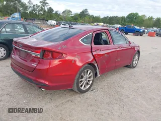 2017 Ford Fusion SE z VIN 3FA6P0HD2HR401046, wystawiony jako IAAI lot #41965539 z przebiegiem 92 664 mil mil oraz . Historia ofert i sprzedaży dostępna na DreamBid. Obrazek 4.