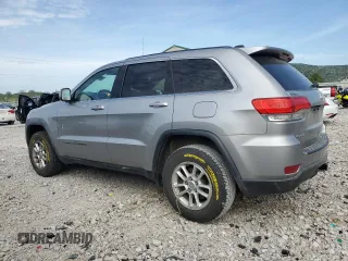 2018 Jeep Grand Cherokee Laredo with VIN 1C4RJFAG4JC122038, listed as a Copart auction lot 54351465 with 101,314 mi miles and Salvage title. Bid and sale history available at DreamBid. Image 2.