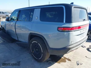 2025 Rivian R1S Adventure with VIN 7PDSGBBA5SN052535, listed as a IAAI auction lot 41200640 with 285 mi miles. Bid and sale history available at carsss.com. Image 3.
