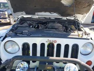 2012 Jeep Wrangler Unlimited Sahara with VIN 1C4BJWEG2CL117080, listed as a IAAI auction lot 41868590 with 92,475 mi miles. Bid and sale history available at carsss.com. Image 10.