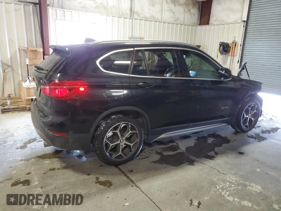 2018 BMW X1 xDrive28i with VIN WBXHT3C35J5K30657, listed as a Copart auction lot 43612815 with 61,181 mi miles and Salvage Title. Bid and sale history available at carsss.com. Image 3.