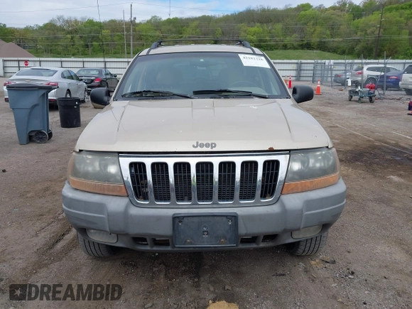 2000 Jeep Grand Cherokee Laredo with VIN 1J4GW48SXYC100248, listed as a IAAI auction lot 42182318 with 227,658 mi miles and . Bid and sale history available at DreamBid. Image 12.