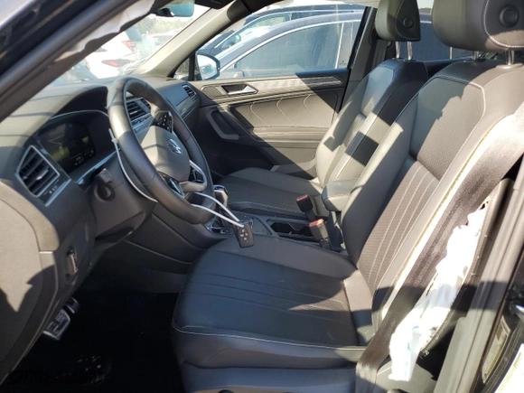 2023 Volkswagen Tiguan SE R-Line Black with VIN 3VVCB7AX1PM122483, listed as a Copart auction lot 42563035 with 22,054 mi miles and Salvage Title. Bid and sale history available at carsss.com. Image 7.