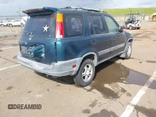 1997 Honda CR-V with VIN JHLRD1850VC057518, listed as a IAAI auction lot 41948236 with 251,707 mi miles. Bid and sale history available at carsss.com. Image 4.
