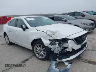 2015 Mazda Mazda6 i Sport with VIN JM1GJ1U68F1170884, listed as a IAAI auction lot 39229424 with 99,317 mi miles. Bid and sale history available at carsss.com. Image 1.