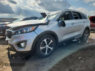 2016 Kia Sorento EX z VIN 5XYPHDA12GG016467, wystawiony jako Copart lot #64831595 z przebiegiem Nie podano mil oraz Szkoda całkowita • Salvage title. Historia ofert i sprzedaży dostępna na DreamBid. Obrazek 1.