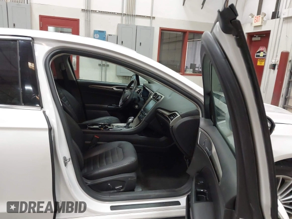 2016 Ford Fusion SE с VIN 3FA6P0H90GR194232, выставлен на аукционе IAAI как лот 42452759 с пробегом 99 310 миль миль и . История ставок и продаж доступна на DreamBid. Изображение 5.
