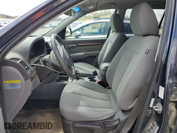 2011 Hyundai Santa Fe GLS z VIN 5XYZGDAB7BG069940, wystawiony jako Copart lot #55537485 z przebiegiem 246 496 mil mil oraz Czysty tytuł • Clean title. Historia ofert i sprzedaży dostępna na DreamBid. Obrazek 7.