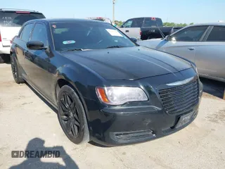2013 Chrysler 300 with VIN 2C3CCAAGXDH660851, listed as a IAAI auction lot 41970721 with 112,017 mi miles. Bid and sale history available at carsss.com. Image 1.