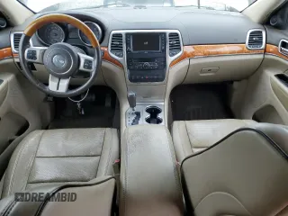 2011 Jeep Grand Cherokee Overland with VIN 1J4RR6GT9BC696319, listed as a Copart auction lot 56914185 with 211,661 mi miles and Salvage title. Bid and sale history available at DreamBid. Image 8.