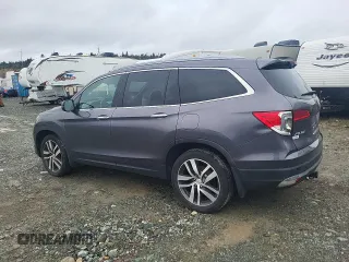 2018 Honda Pilot Touring z VIN 5FNYF6H93JB500695, wystawiony jako Copart lot #83302284 z przebiegiem 12 086 mil mil oraz Szkoda całkowita • Salvage title. Historia ofert i sprzedaży dostępna na DreamBid. Obrazek 2.