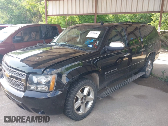 2008 Chevrolet Suburban LTZ with VIN 1GNFK16328R161721, listed as a IAAI auction lot 42130017 with 242,266 mi miles. Bid and sale history available at carsss.com. Image 2.