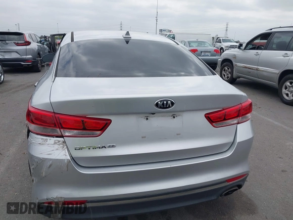 2016 Kia Optima LX with VIN 5XXGT4L34GG023812, listed as a IAAI auction lot 42034160 with 96,720 mi miles and . Bid and sale history available at DreamBid. Image 16.
