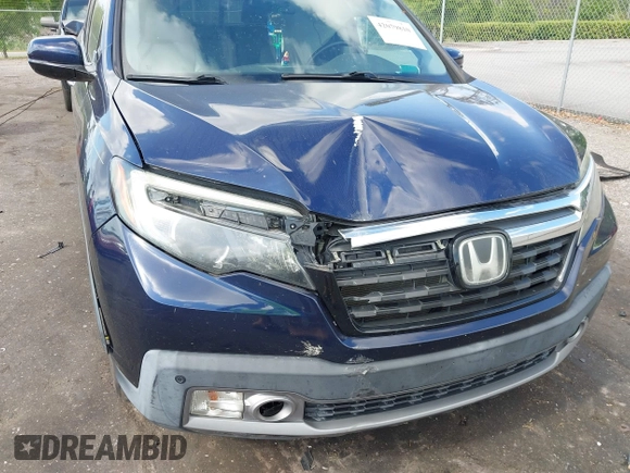 2019 Honda Ridgeline RTL-E with VIN 5FPYK3F76KB010613, listed as a IAAI auction lot 42079810 with 90,492 mi miles and . Bid and sale history available at DreamBid. Image 6.