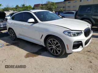 2021 BMW X4 xDrive30i with VIN 5UX2V1C0XM9E11002, listed as a Copart auction lot 67348653 with 27,805 mi miles. Bid and sale history available at carsss.com. Image 4.
