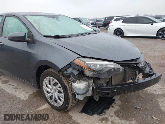 2018 Toyota Corolla L z VIN 5YFBURHE7JP831763, wystawiony jako IAAI lot #41539485 z przebiegiem 95 495 mil mil oraz . Historia ofert i sprzedaży dostępna na DreamBid. Obrazek 6.