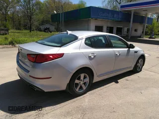 2014 Kia Optima LX with VIN 5XXGM4A70EG340051, listed as a IAAI auction lot 42048762 with 146,519 mi miles. Bid and sale history available at carsss.com. Image 4.