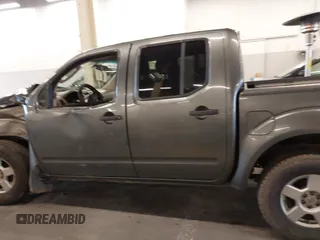 2005 Nissan Frontier LE with VIN 1N6AD07W95C451921, listed as a IAAI auction lot 40952064 with 234,900 mi miles and . Bid and sale history available at DreamBid. Image 14.