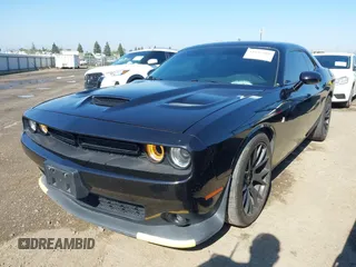2019 Dodge Challenger R/T Scat Pack z VIN 2C3CDZFJ9KH556896, wystawiony jako IAAI lot #41892608 z przebiegiem 60 747 mil mil oraz . Historia ofert i sprzedaży dostępna na DreamBid. Obrazek 2.