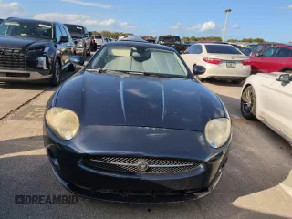 2007 Jaguar XK with VIN SAJWA43B075B09846, listed as a Copart auction lot 76014244 with 0 mi miles and Salvage Title. Bid and sale history available at carsss.com. Image 5.