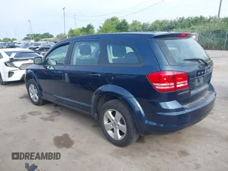 2013 Dodge Journey American Value with VIN 3C4PDCAB2DT529530, listed as a IAAI auction lot 42798001 with Not provided miles and . Bid and sale history available at DreamBid. Image 3.