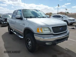 2003 Ford F-150 XLT with VIN 1FTRW08LX3KC79700, listed as a IAAI auction lot 41680562 with 131,052 mi miles. Bid and sale history available at carsss.com. Image 1.
