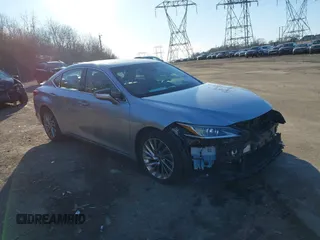 2022 Lexus ES 300h Luxury with VIN 58AEA1C12NU019988, listed as a IAAI auction lot 41568313 with 61,505 mi miles and . Bid and sale history available at DreamBid. Image 1.