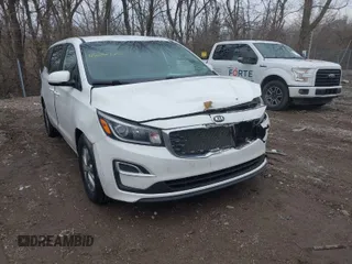 2021 Kia Sedona LX with VIN KNDMB5C19M6662112, listed as a IAAI auction lot 41684140 with 57,874 mi miles. Bid and sale history available at carsss.com. Image 1.